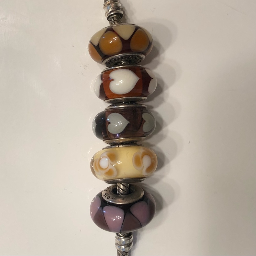 Set of five pandora murano glass beads